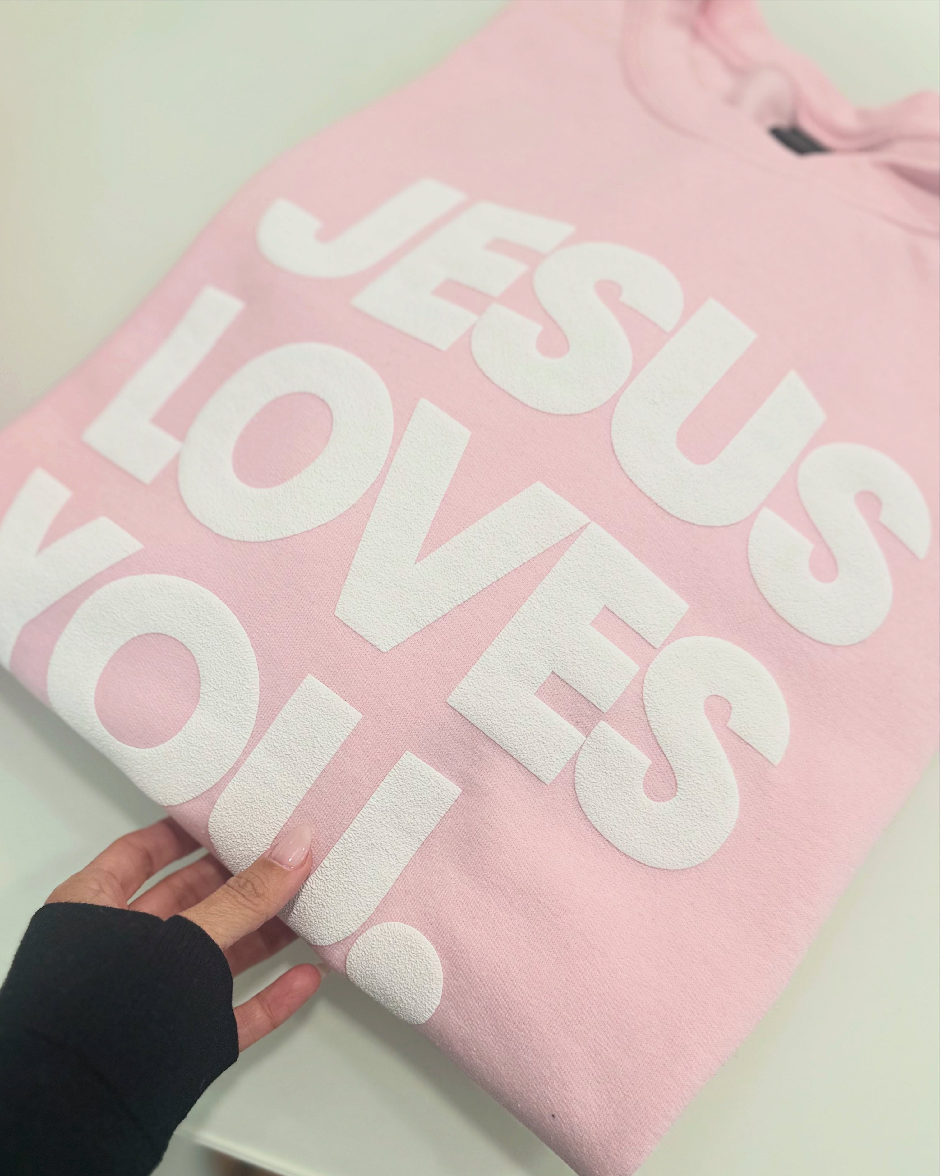 JESUS LOVES YOU.  white letters sweatshirt