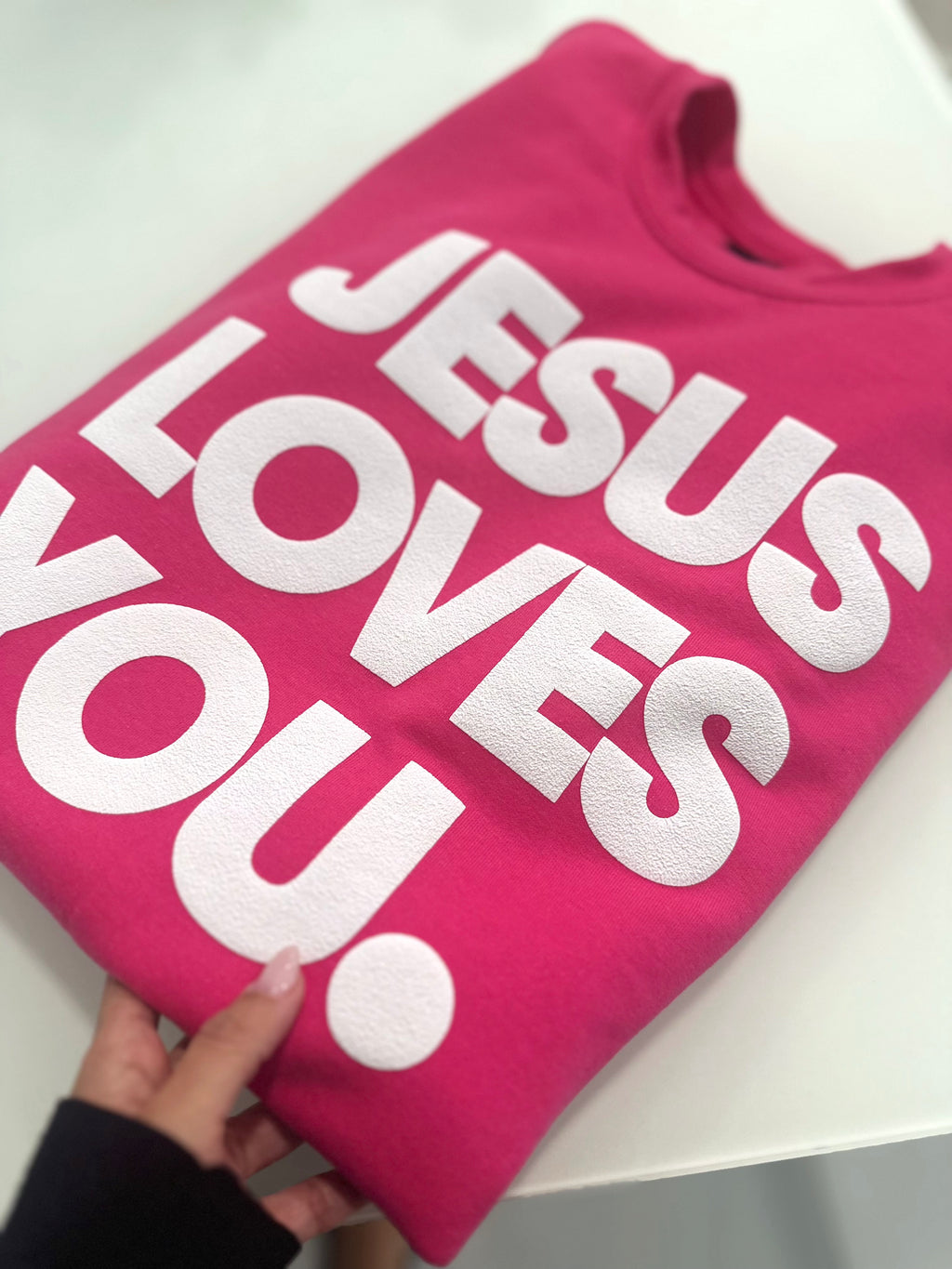 JESUS LOVES YOU.  white letters sweatshirt