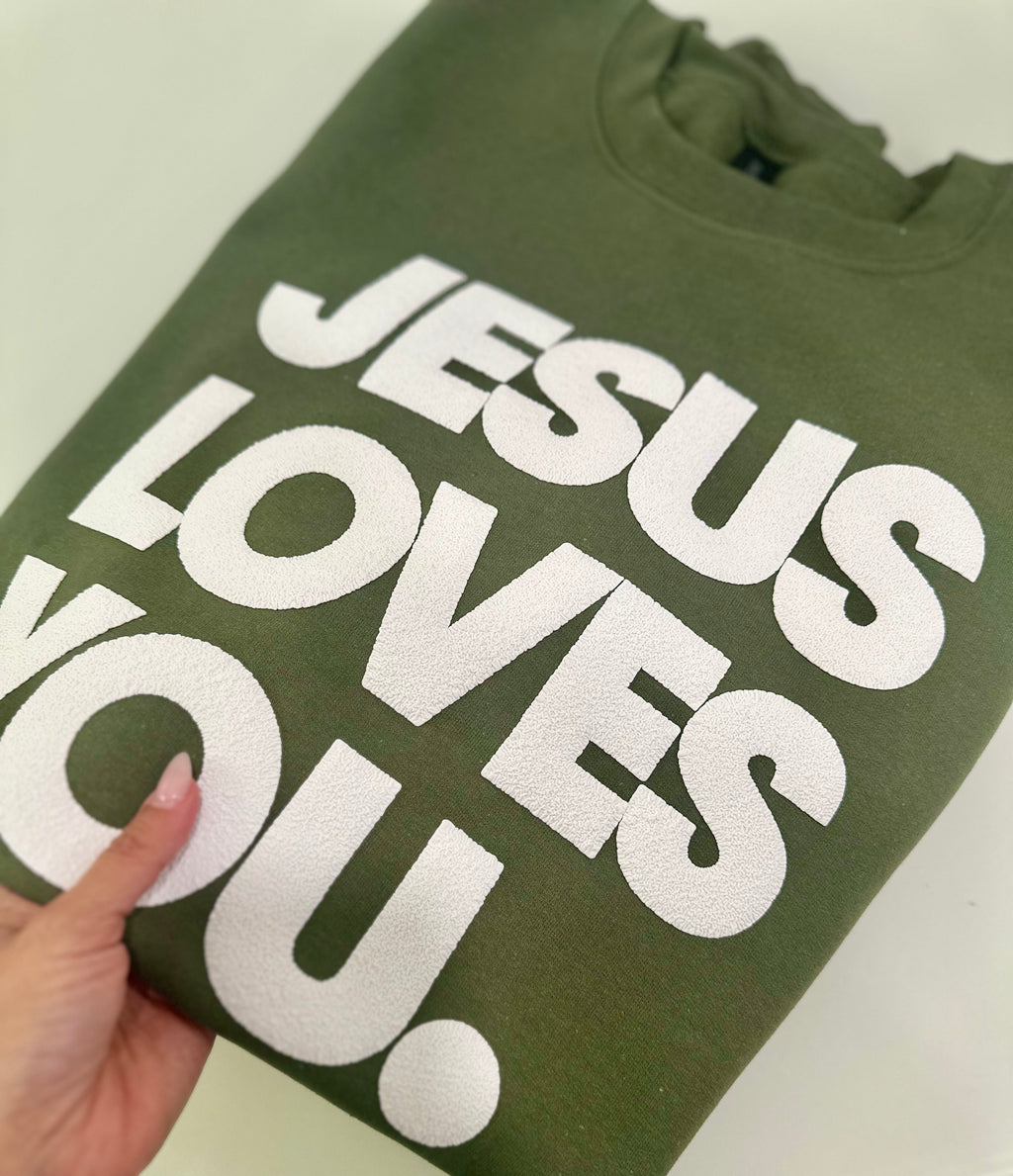 JESUS LOVES YOU.  white letters sweatshirt