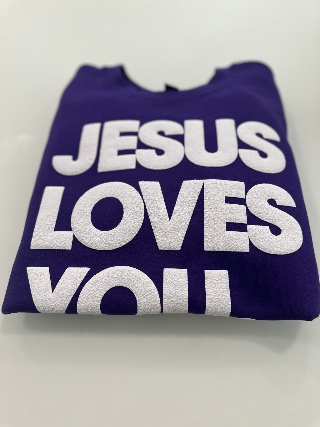 JESUS LOVES YOU.  white letters sweatshirt
