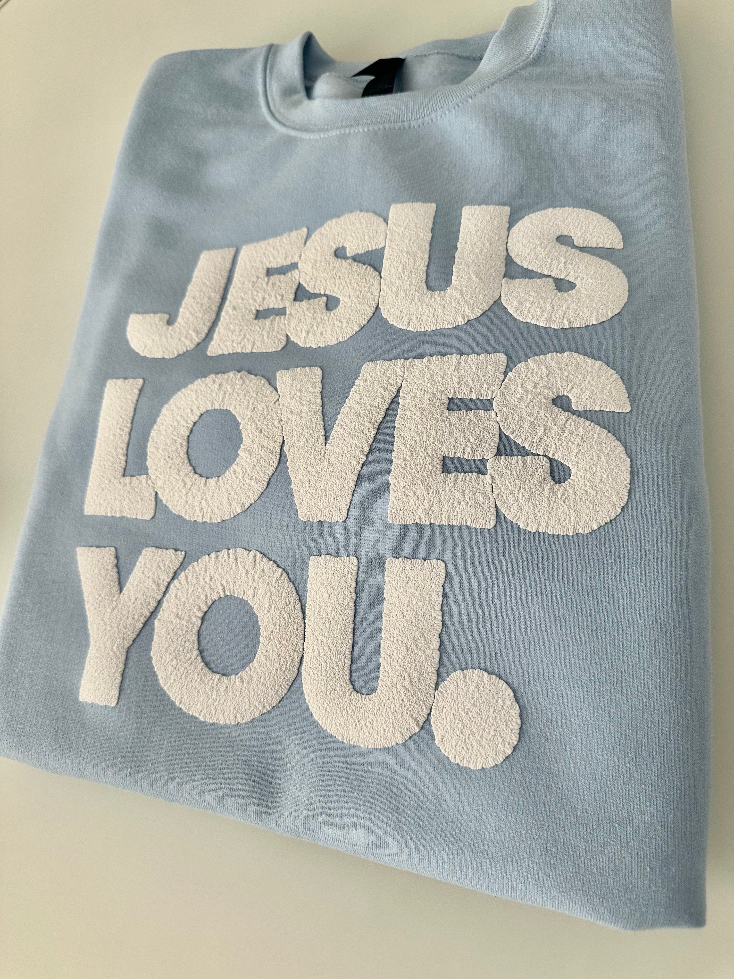 JESUS LOVES YOU.  white letters sweatshirt