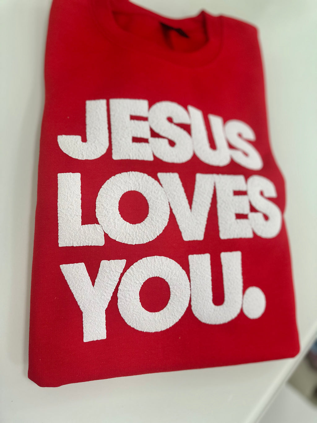 JESUS LOVES YOU.  white letters sweatshirt