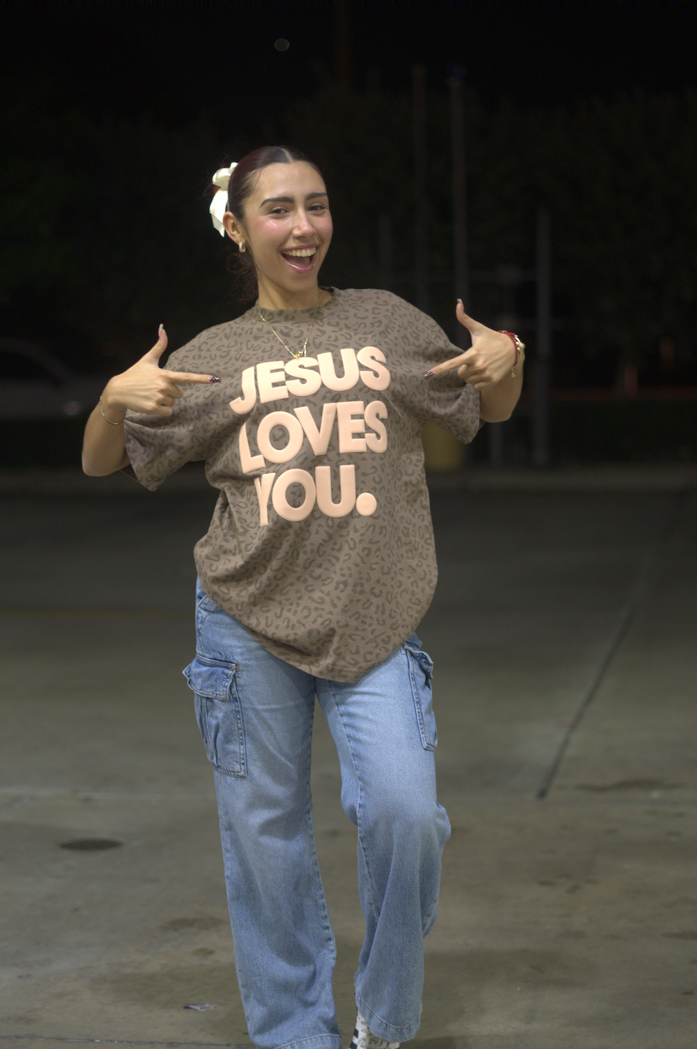 Vintage Leopard Print “Jesus Loves You” Oversized Tee
