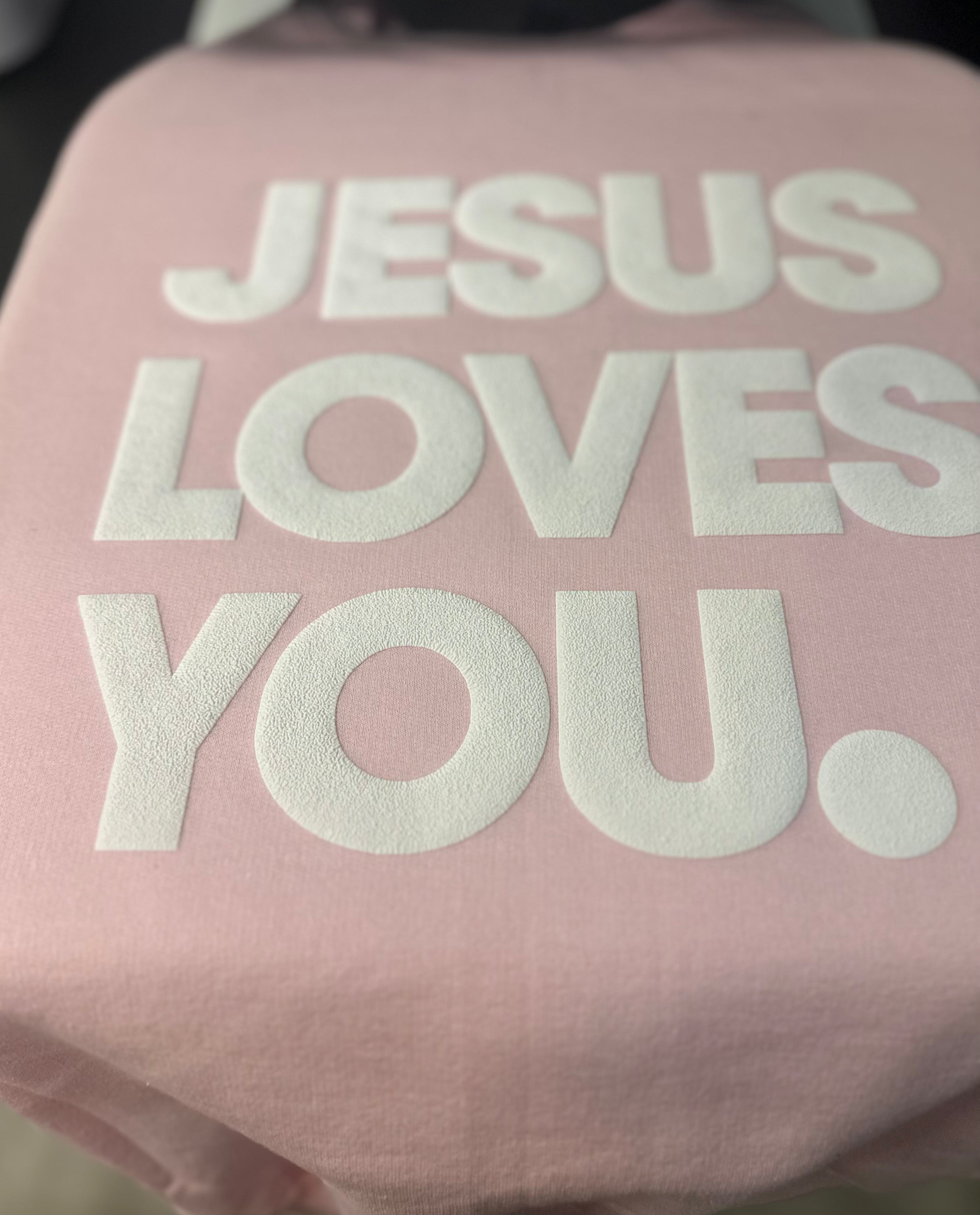 JESUS LOVES YOU.  white letters sweatshirt